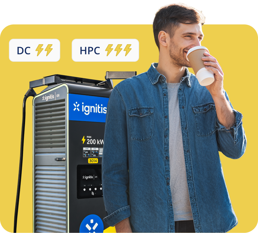 Mees joob kohvi, kuni ta laeb oma elektriautot Ignitis ONi kiirlaadimisjaamas.